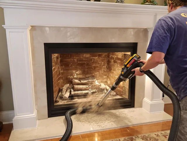 Fireplace cleaning performed by Raynham Chimney Sweep in Raynham, MA